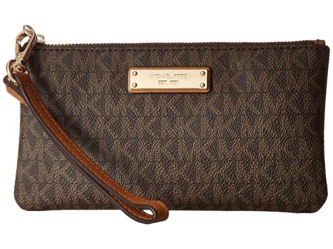 michael kors women's wristlet|Michael Kors wristlets on sale.